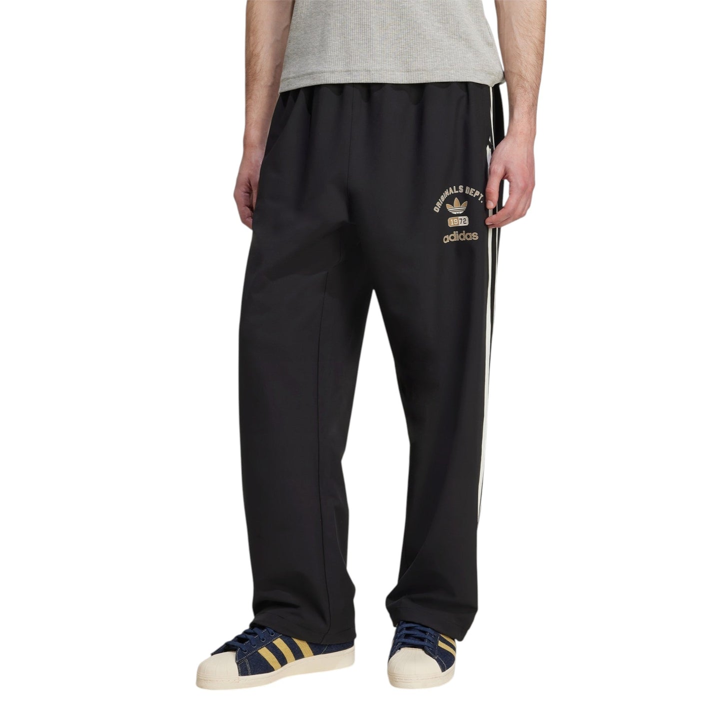Woven Firebird Track Pants by adidas