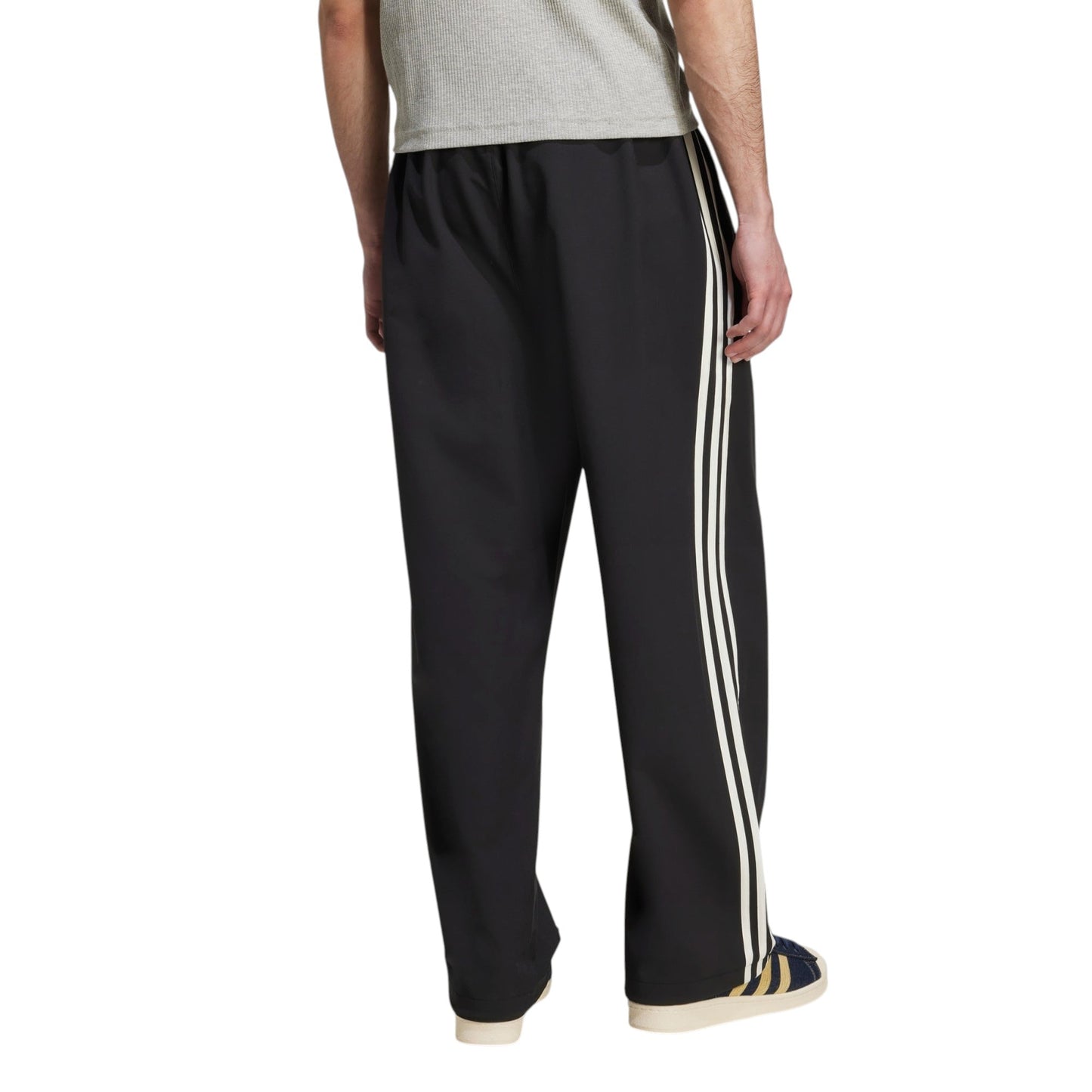 Woven Firebird Track Pants by adidas