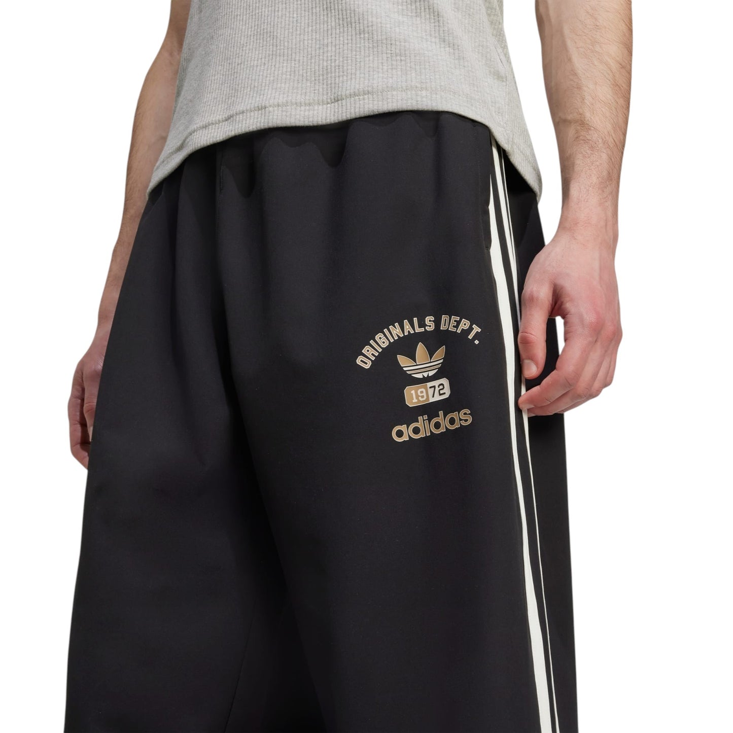 Woven Firebird Track Pants by adidas