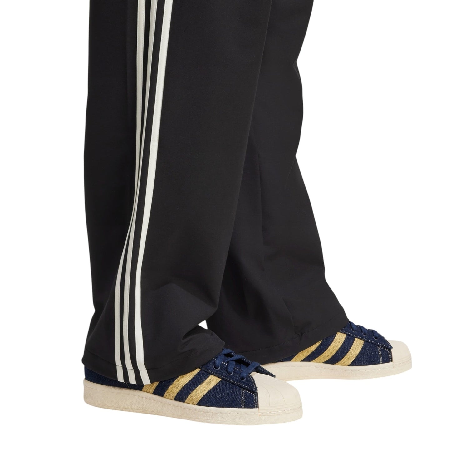 Woven Firebird Track Pants by adidas